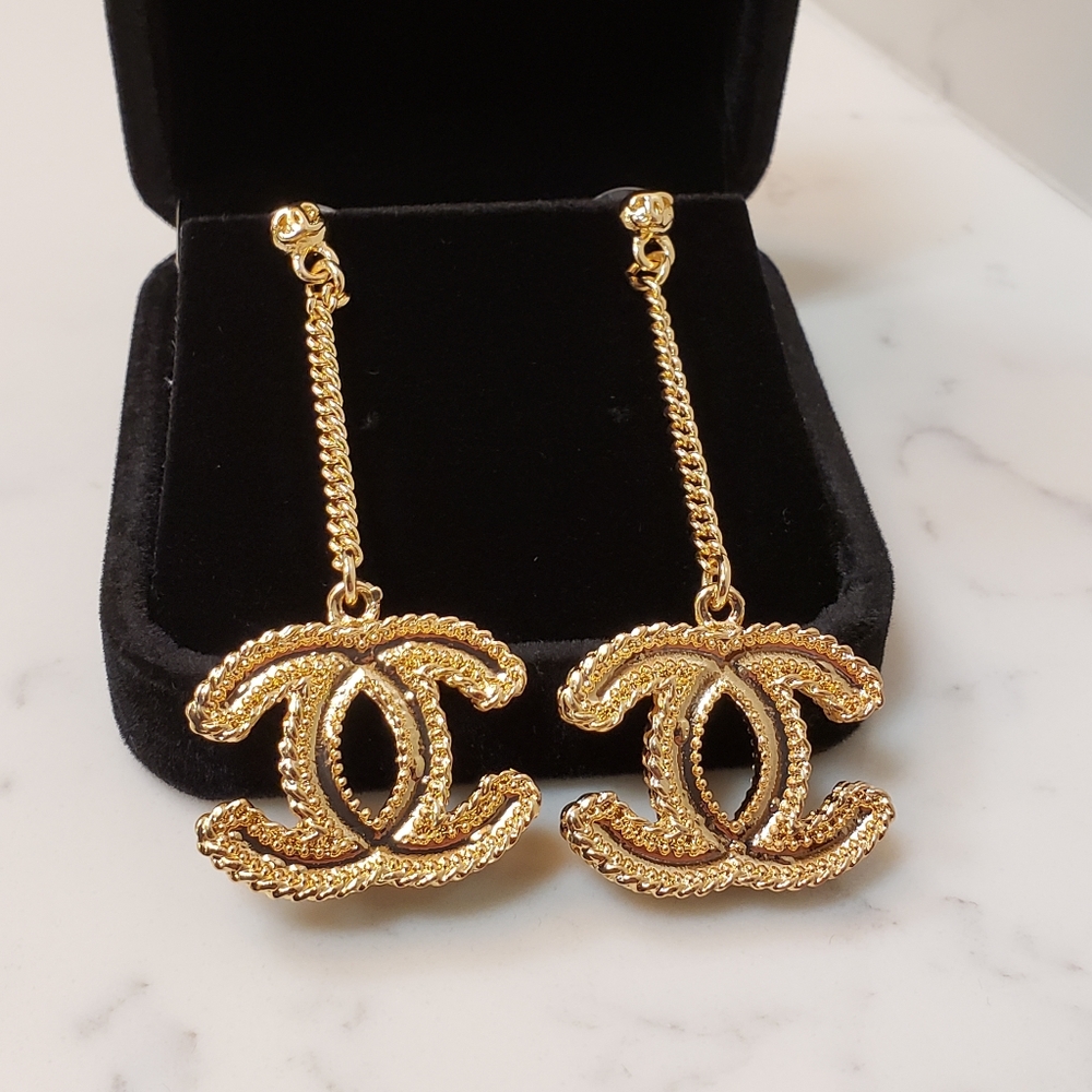 Vtg Coco Chanel gold charm drop hanging earrings